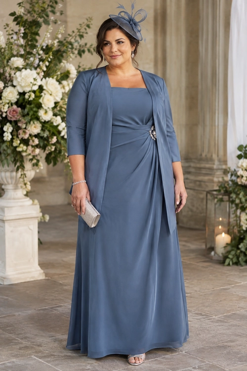 Blue Formal Dress with Fascinator A woman wears a slate-blue floor-length dress with a matching long jacket, fascinator, silver clutch, and open-toe shoes.