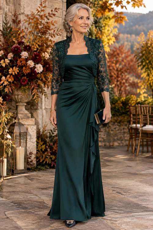 Dark Teal Lace Evening Dress A woman wears a floor-length dark teal dress with a lace jacket, draped skirt, clutch, and pointed shoes.