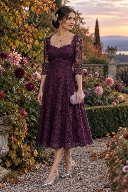 Woman wearing a plum lace midi dress with silver heels and a matching clutch in a garden setting.