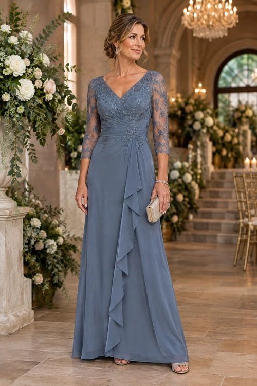 Slate Blue Lace-Sleeve Evening Dress A woman wears a slate blue floor-length dress with lace sleeves, a draped ruffle front, and a small metallic clutch.